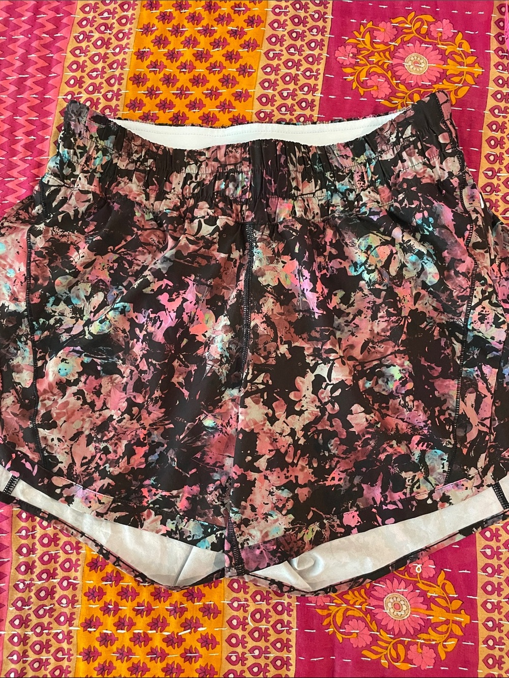 lululemon athletica Black Floral Athletic Shorts with Pink & Teal Highlights